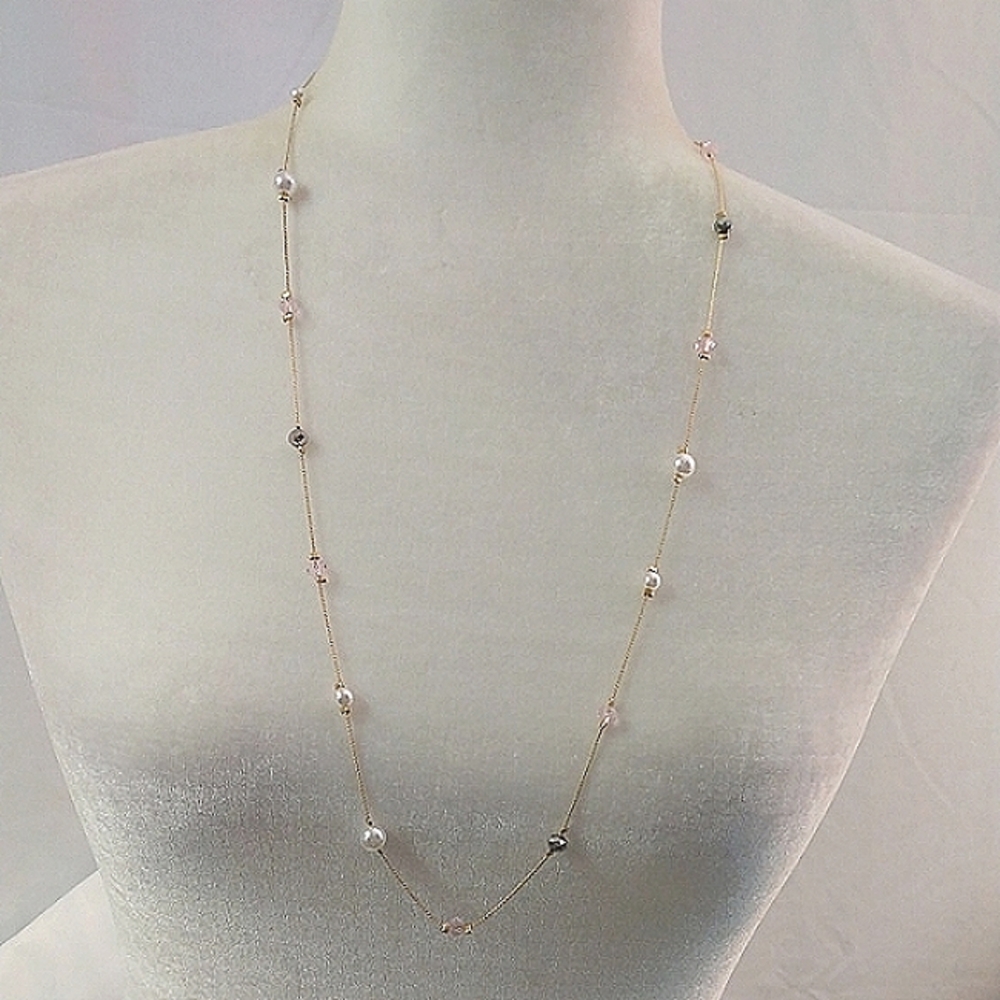 Simple, but pretty, gold tone necklace with faux pearls and beads. NWT